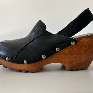 Chunky black rock and roll clogs